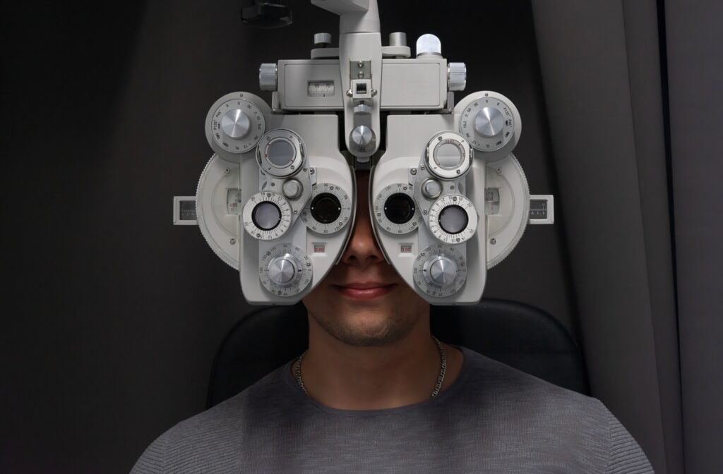 A person at an eye exam getting their prescription updated